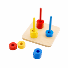 Colored Discs on 3 Colored Dowels