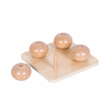 Wooden Ellipsoids on Small Pegs